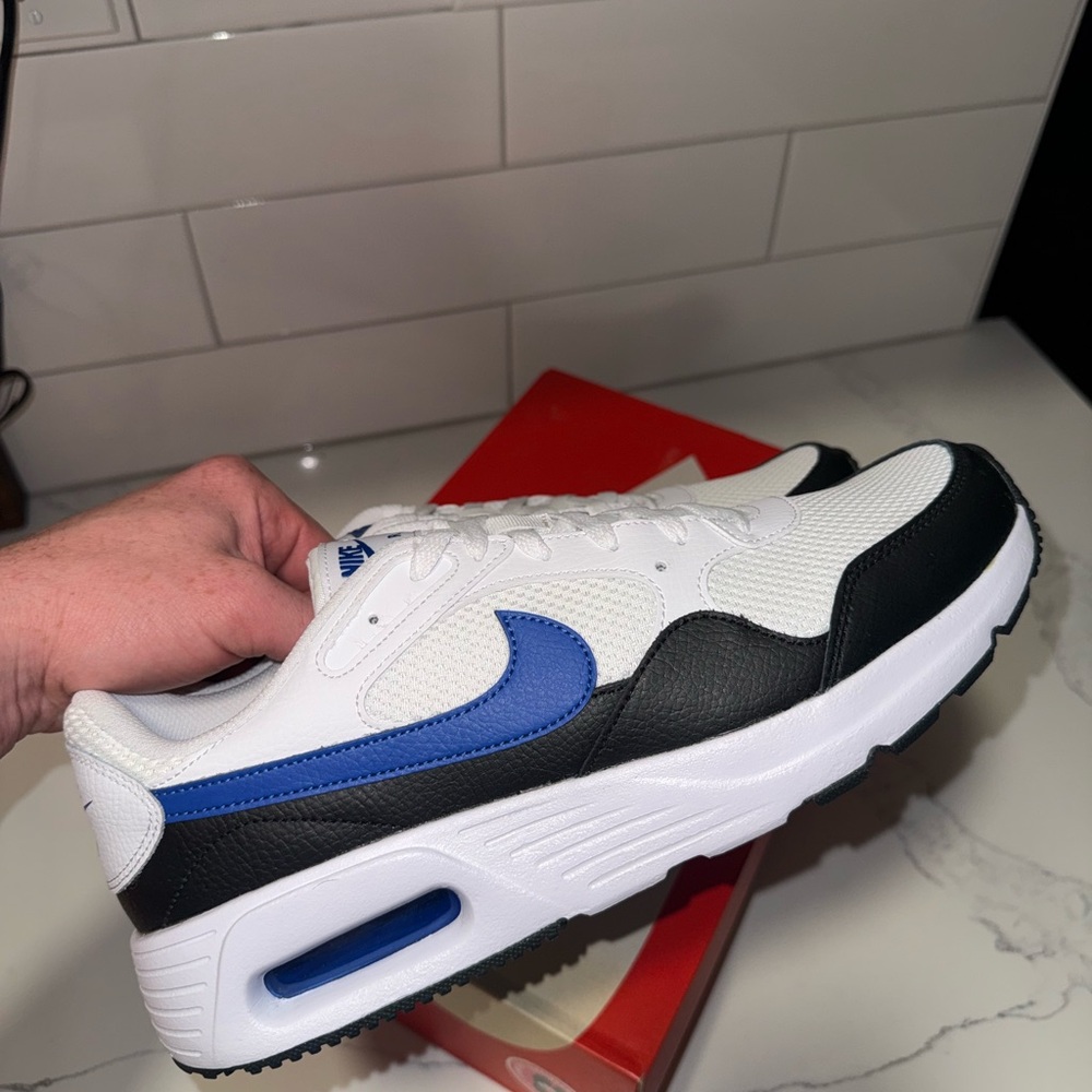Nike Men's White, Blue, and Black Sneakers. New and never worn.